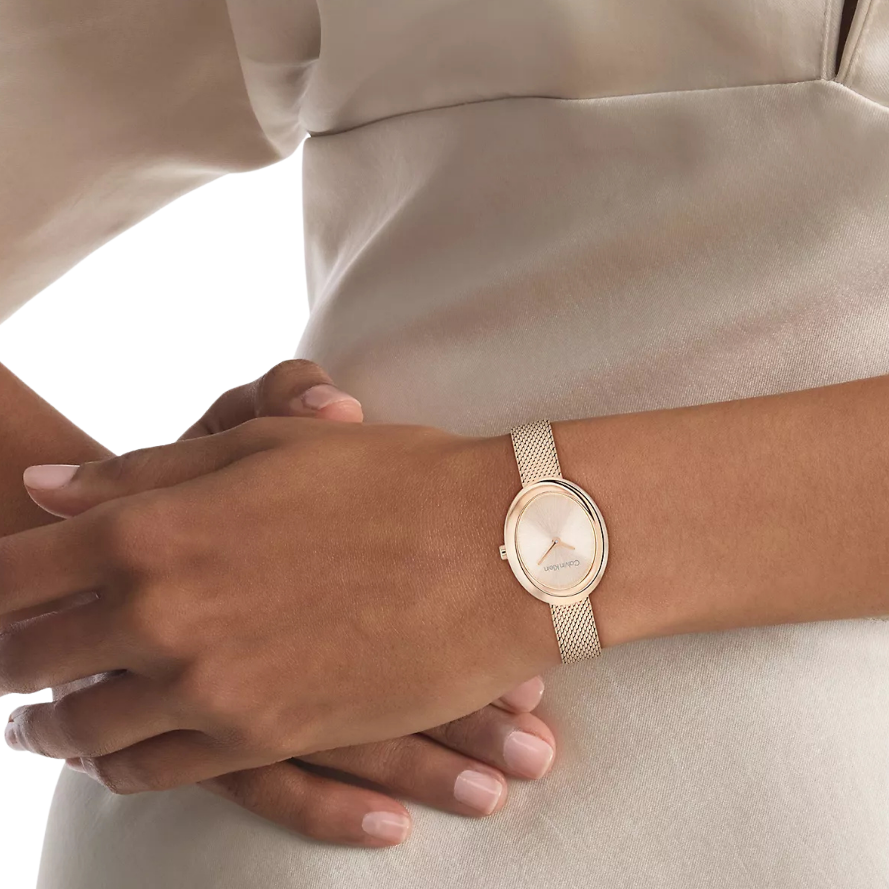 Calvin Klein Women Contoured Bezel Oval Dial Watch - Gold